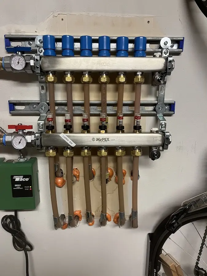 Plumber performing Water Heater Repair at a residential property in McSwain